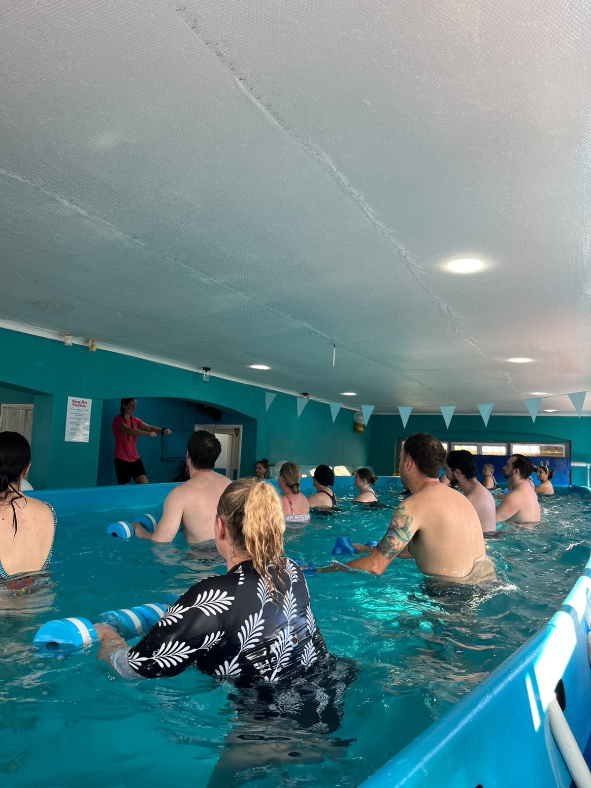 Instructor-led AUF Original class in a heated indoor pool